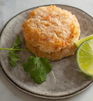 Shrimp burgers on a plate.